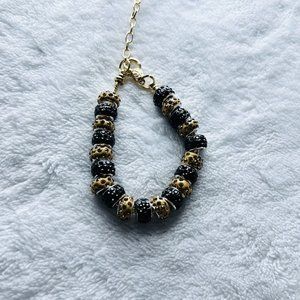 Handcrafted black and gold bead bracelet